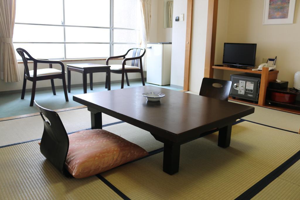 Hotel Sankeien Sapporo Cameră foto